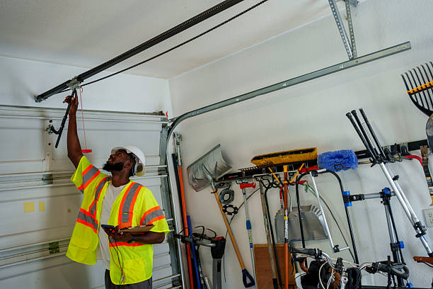 Professional Garage Door Panel Replacement technician working in Alexandria, IN